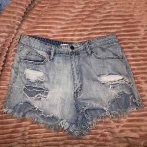 Light washed ripped jean shorts